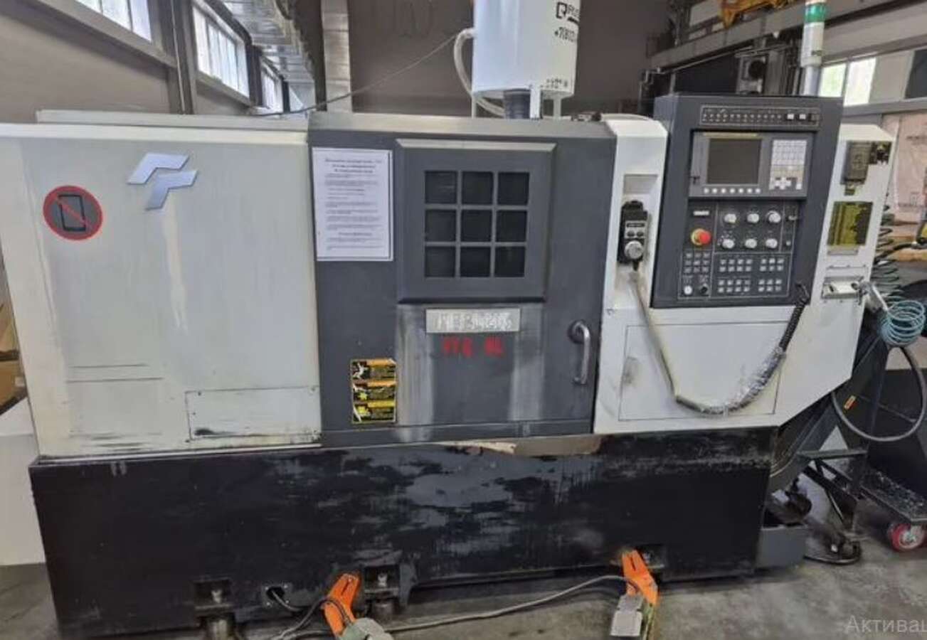 Токарный обрабатывающий центр с ЧПУ Feeler FTC-20L