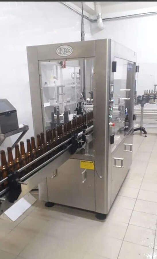 Линия розлива в стеклобутылку Италия триблок