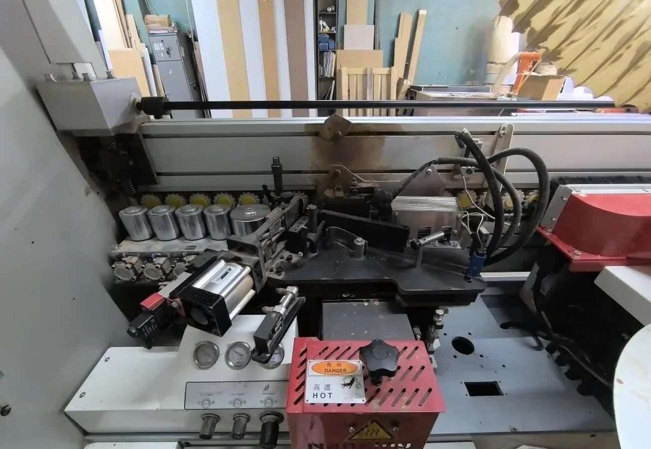Кромкооблицовочный станок Nanxing NB7CJ