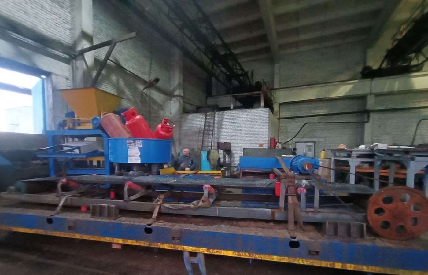 Линия производства тротуарной плитки и бордюров