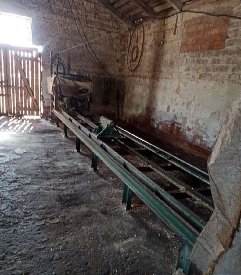 Станок для производства оцилиндрованного бревна