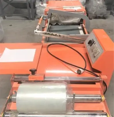 Термоусадочный упаковочный комплекс Hualian BS4525LA + BSL-5045L