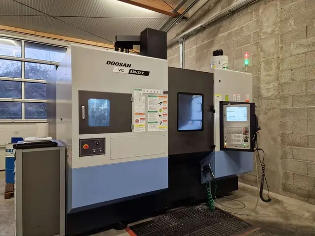 Обрабатывающий центр DOOSAN VC 630/5AX 5-ти осевой