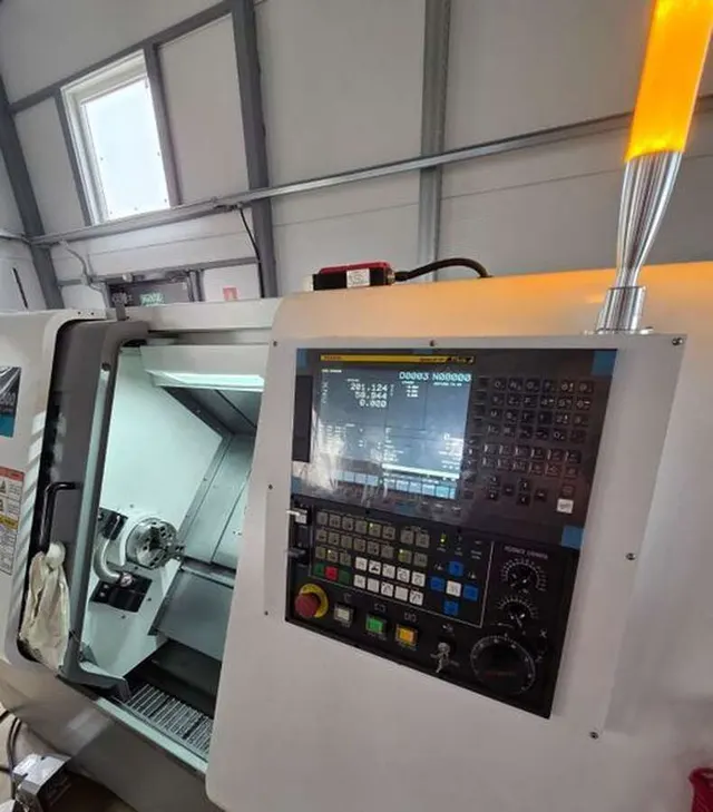Токарный станок с ЧПУ Fanuc