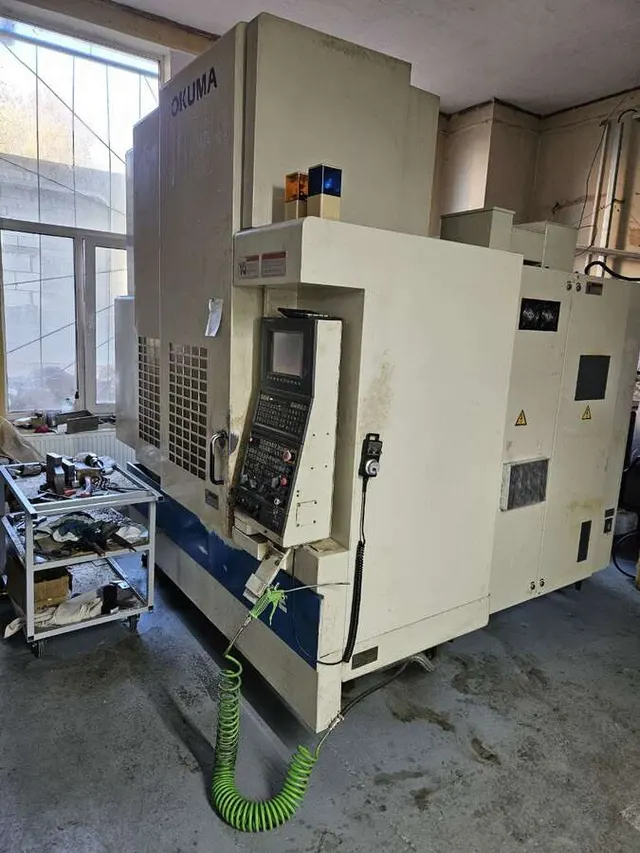 Обрабатывающий центр OKUMA MX 45 VAE с ЧПУ